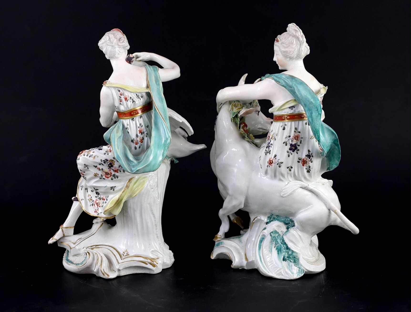 A rare pair of Derby figures of Leda and the Swan and Europa and the Bull, c.1765, 26.5 and 27.5cm high 26.5cm and 27.5cm high, restorations